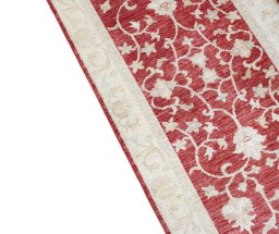 Backside of handmade New Farahan rug showing knot structure and weave density
