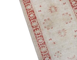 Backside of handmade New Farahan rug showing knot structure and weave density