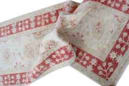 Backside of handmade New Farahan rug showing knot structure and weave density