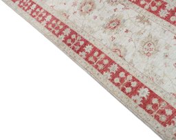 Backside of handmade New Farahan rug showing knot structure and weave density