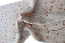 Backside of handmade New Farahan rug showing knot structure and weave density