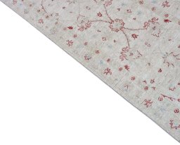 Backside of handmade New Farahan rug showing knot structure and weave density