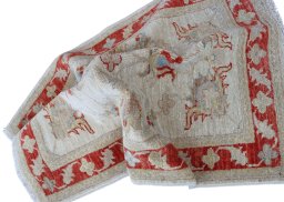 Backside of handmade New Farahan rug showing knot structure and weave density