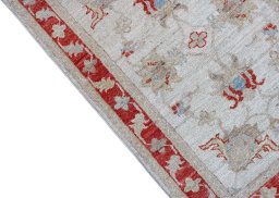 Backside of handmade New Farahan rug showing knot structure and weave density