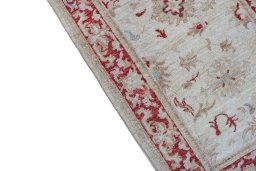 Backside of handmade New Farahan rug showing knot structure and weave density