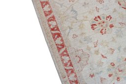 Backside of handmade New Farahan rug showing knot structure and weave density