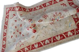 Backside of handmade New Farahan rug showing knot structure and weave density