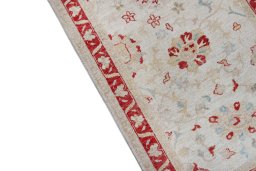 Backside of handmade New Farahan rug showing knot structure and weave density