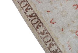 Backside of handmade New Farahan rug showing knot structure and weave density