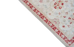 Backside of handmade New Farahan rug showing knot structure and weave density