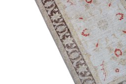 Backside of handmade New Farahan rug showing knot structure and weave density