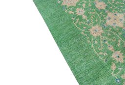 Backside of handmade New Farahan rug showing knot structure and weave density