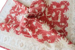Backside of handmade New Farahan rug showing knot structure and weave density