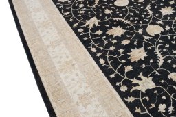 Backside of handmade New Farahan rug showing knot structure and weave density