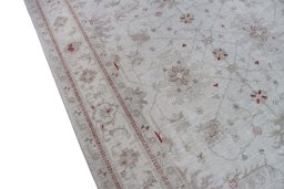 Backside of handmade New Farahan rug showing knot structure and weave density