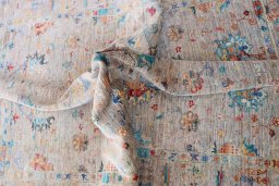 Backside of handmade New Farahan rug showing knot structure and weave density