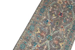 Backside of handmade New Farahan rug showing knot structure and weave density