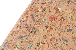 Backside of handmade New Farahan rug showing knot structure and weave density