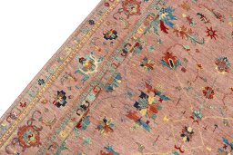 Backside of handmade New Farahan rug showing knot structure and weave density