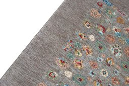 Backside of handmade New Farahan rug showing knot structure and weave density