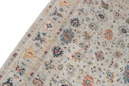 Backside of handmade New Farahan rug showing knot structure and weave density