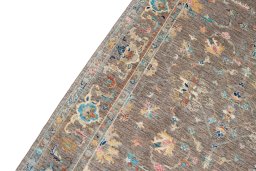 Backside of handmade New Farahan rug showing knot structure and weave density