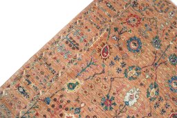 Backside of handmade New Farahan rug showing knot structure and weave density