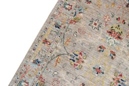 Backside of handmade New Farahan rug showing knot structure and weave density