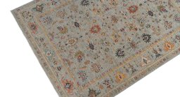 Backside of handmade New Farahan rug showing knot structure and weave density