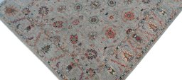 Backside of handmade New Farahan rug showing knot structure and weave density