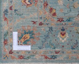 Corner detail of New Farahan rug showing border pattern and Wool pile