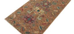 Backside of handmade New Farahan rug showing knot structure and weave density