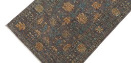 Backside of handmade New Farahan rug showing knot structure and weave density
