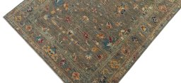 Backside of handmade New Farahan rug showing knot structure and weave density