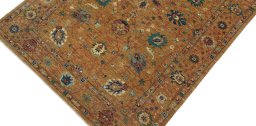 Backside of handmade New Farahan rug showing knot structure and weave density