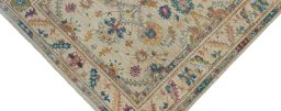 Backside of handmade New Farahan rug showing knot structure and weave density