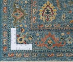 Corner detail of New Farahan rug showing border pattern and Wool pile