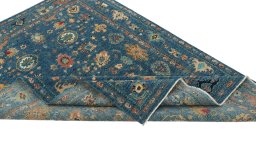 Central medallion detail of New Farahan rug from Pakistan