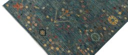 Backside of handmade New Farahan rug showing knot structure and weave density