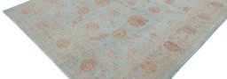 Backside of handmade New Farahan rug showing knot structure and weave density