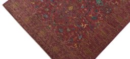 Backside of handmade New Farahan rug showing knot structure and weave density