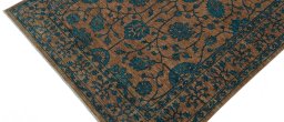 Backside of handmade New Farahan rug showing knot structure and weave density