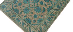 Backside of handmade New Farahan rug showing knot structure and weave density