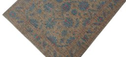 Backside of handmade New Farahan rug showing knot structure and weave density