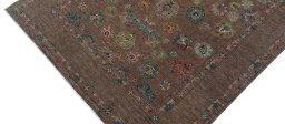 Backside of handmade New Farahan rug showing knot structure and weave density