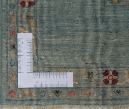 Corner detail of New Farahan rug showing border pattern and Wool pile
