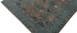 Backside of handmade New Farahan rug showing knot structure and weave density
