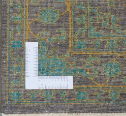Corner detail of New Farahan rug showing border pattern and Wool pile