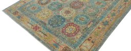 Backside of handmade New Farahan rug showing knot structure and weave density