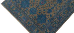 Backside of handmade New Farahan rug showing knot structure and weave density